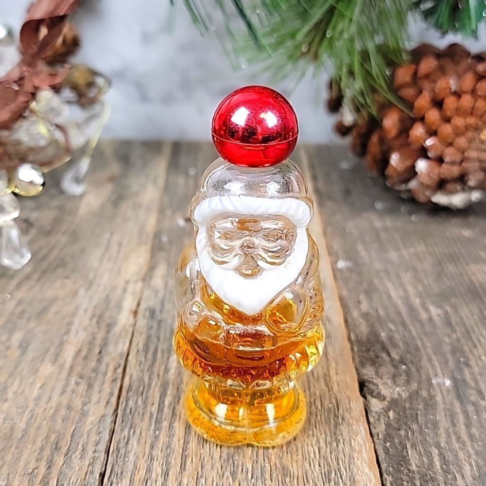 Vintage Avon " Jolly Santa " glass perfume bottle.